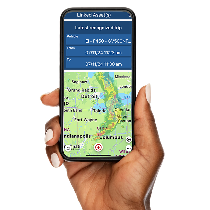 Weather with Automated Trip ID Hand holding phone showing Weather with Automated Trip ID